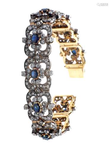 A diamond and sapphire bracelet. Mounted in gold and silver