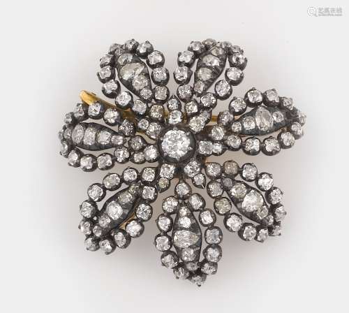 A diamond, gold and silver brooch/pendant