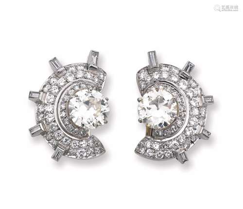 An Art Deco diamond and platinum earrings
