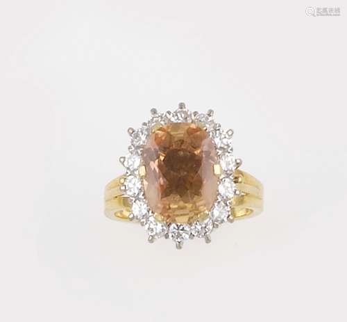 A natural topaz and diamond ring