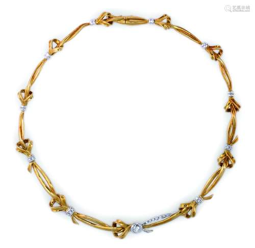 A gold and diamond necklace. Damiani