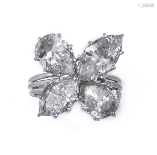 A pear - cut and marquise - cut diamond ring