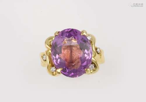 A diamond and amethyst ring