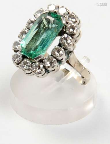 An emerald and old-cut diamond clust ring