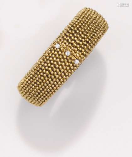 A diamond and gold bracelet