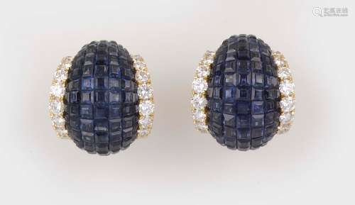 A pair of brillant - cut diamond and sapphire earrings