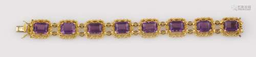An amethyst and gold bracelet