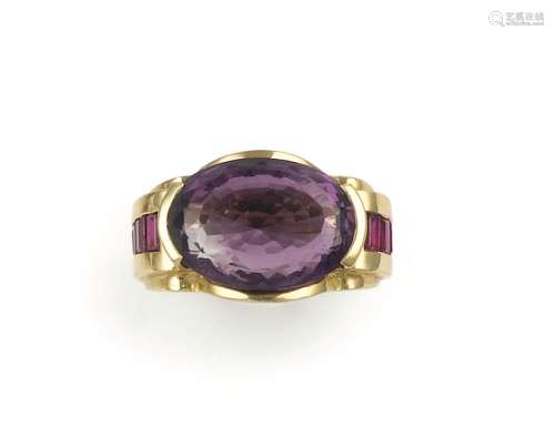 An amethyst and ruby ring