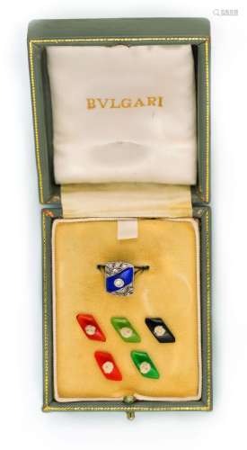 A diamond, gem-set and platinum ring. Bulgari