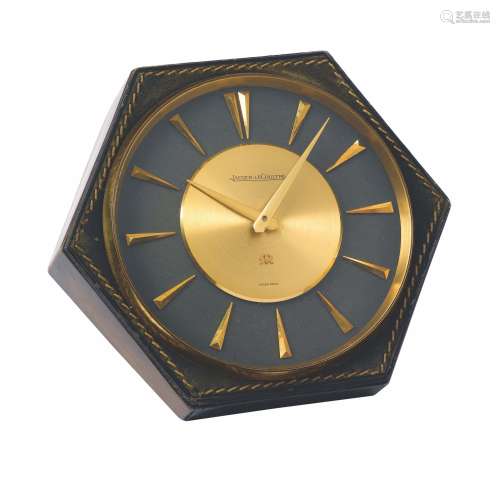 Jaeger LeCoultre for Hermes, exagonal gilt brass and leather hand wound table clock. Made in the 1960's.