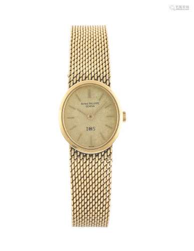 PATEK PHILIPPE, Ref.4109, case No. 2681462, 18K yellow gold lady's wristwatch with an 18K yellow gold integral weave link bracelet with an 18K deployant clasp. Made circa 1970.