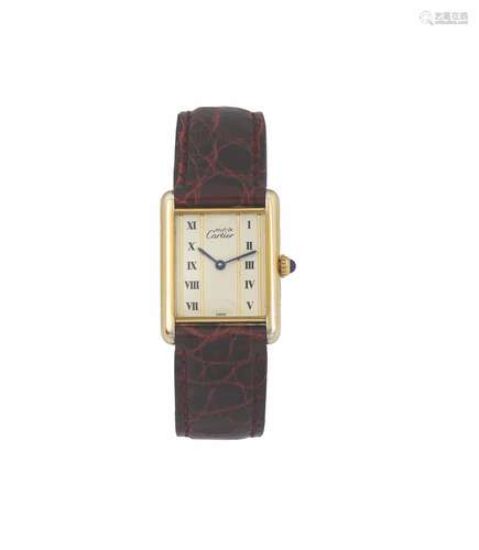 Must de Cartier, Paris, Tank, case No 580005, rectangular, gold-plated sterling silver quartz wristwatch with original buckle. Made circa 1980