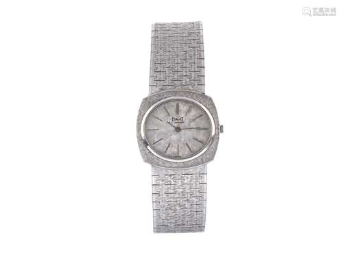 PIAGET, case No. 12441A3, Ref. 74383, 18K white gold, self-winding wristwatch with an 18K white gold bracelet and deployant clasp. Made circa 1970