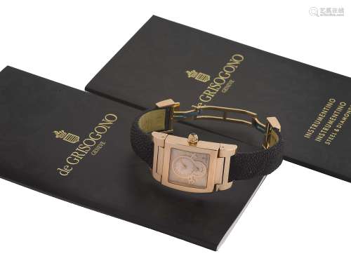DE GRISOGONO, Genève, “Instrumentino”, case No. 016506, elegant, rectangular curved, two time zone, quartz, water-resistant, 18K pink gold  wristwatch with an  18K pink gold double deployant clasp. Accompanied by a De Grisogono fitted box, instruction booklet, and Guarantee.