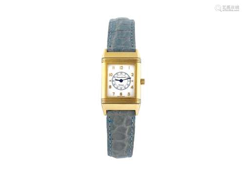JAEGER-LeCOULTRE, “Reverso”, case No. 1646738, Ref. 260.1.08, elegant, rectangular, 18K yellow gold lady’s reversible quartz wristwatch. Made in the 2000's.