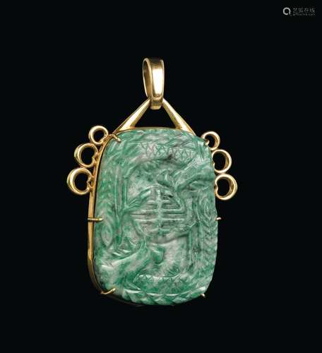 A jadeite pendant with gold setting, China, 20th century