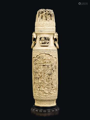 A carved ivory vase and cover with Pho dogs and figures within reserves, China, Qing Dynasty, 19th century