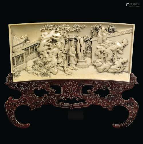 A carved ivory plaque with court life scene, China, Qing Dynasty, 19th century