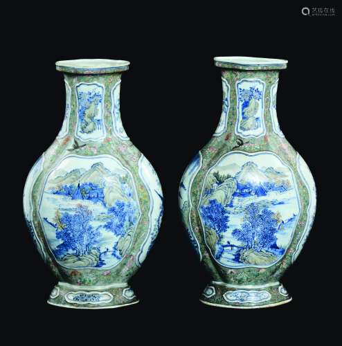 A pair of polychrome enamelled porcelain vases with blue and white reserves depicting river landscapes and floral decoration, China, Qing Dynasty, 19th century