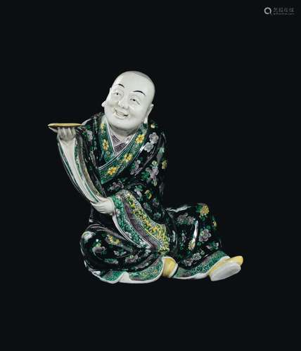 A Famille-Noir porcelain figure of seated dignitary, China, Qing Dynasty, 19th century