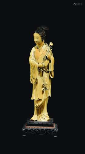 A carved ivory figure of playing Guanyin, China, early 20th century