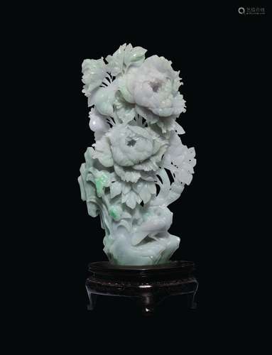 A carved jadeite group with flowers and birds, China, 20th century