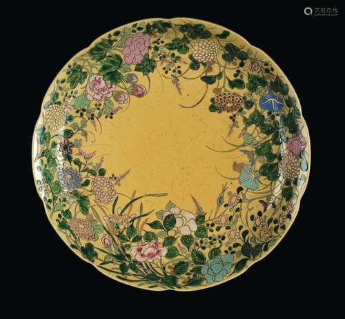 A yellow-ground porcelain dish with roses, China, Qing Dynasty, 19th century