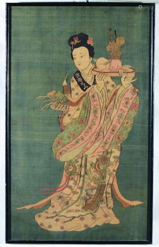 A silk blue-ground Kesi depicting Guanyin with tray, China, Qing Dynasty, 19th century