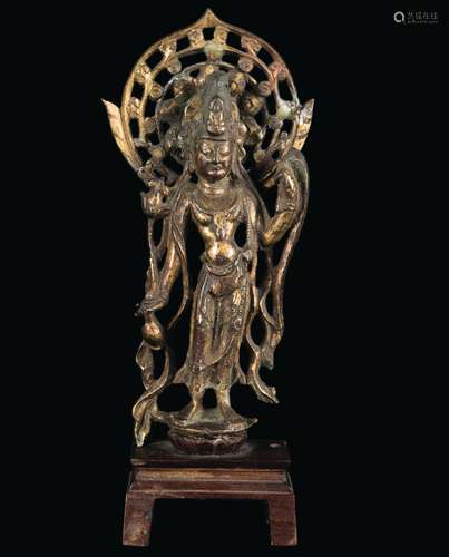 A semi-gilt bronze figure of Avalokitesvara with aura, China, Tang Dynasty (618-906)