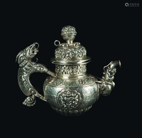 A small embossed silver teapot, Tibet, 19th century
