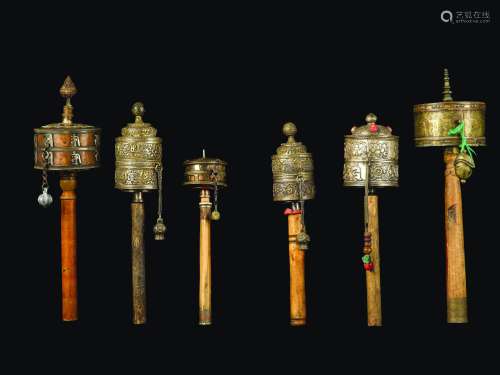 Six copper prayer wheels with semi-precious stone inlays, Tibet, 19th century