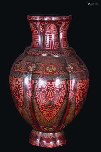 A large red-lacquered vase with taotie mask decoration, China, Qing Dynasty, late 19th century