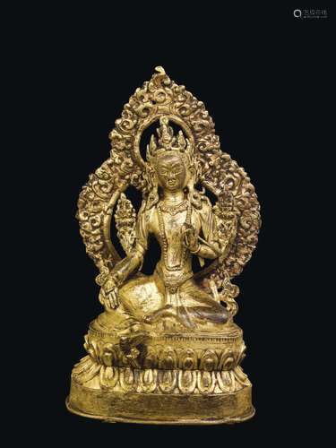 A gilt bronze figure of Sita Manjughosa with aura on a double lotus flower, Nepal, 18th century