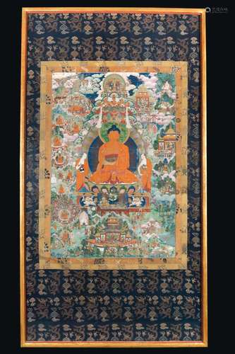 A framed gilt-highlighted silk tanka with a central figure of Buddha, Tibet, 18th century