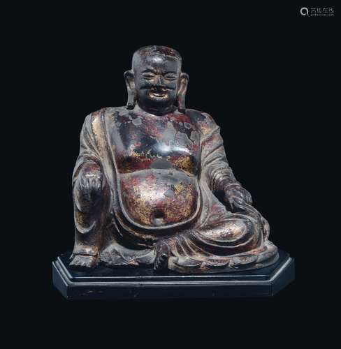 A bronze figure of seated Budai, China, Ming Dynasty, 17th century