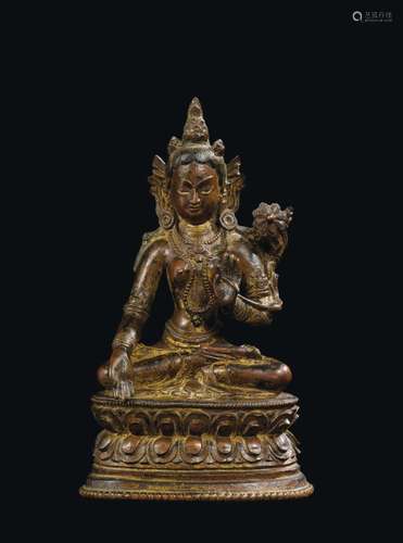 A semi-gilt bronze figure of Amitaya on a double lotus flower, China, Ming Dynasty, 17th century