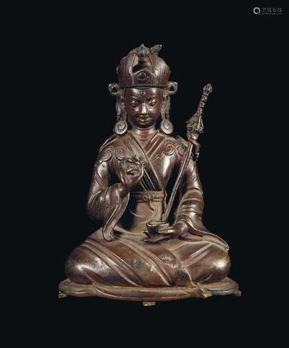 A bronze figure of Padmasambhava with hat, Tibet, 18th century