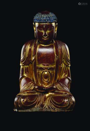 A gilt and lacquered wood figure of seated Buddha, China, Qing Dynasty, 18th century