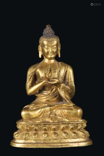 A gilt bronze figure of Sakyamuni on a double lotus flower, China, Qing Dynasty, 18th century