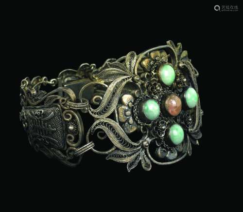 A silver filigree bracelet with jadeite and rose quartz inlays, China, Qing Dynasty, 19th century