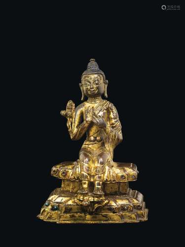 A rare gilt bronze figure of Buddha Maitreya, Tibet, 13th century