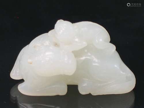 Chinese White Jade Carving of A Monkey Riding on a Horse.