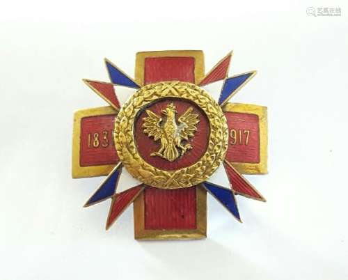 Antique Polish Bronze w/ red enamel military badge