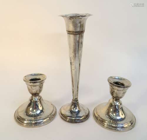 Three Weighted Silver Candlesticks