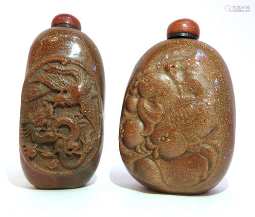 Two Golden Stone Snuff Bottles