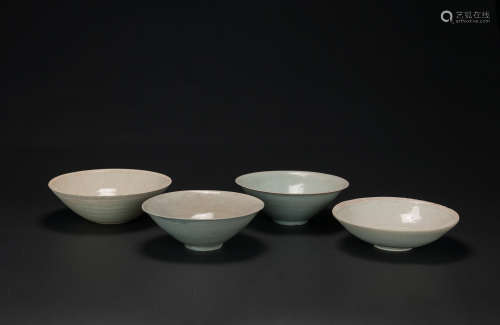 Song-A Group Of Four Qingbai Bowles<br>D:17 - 19 cm.