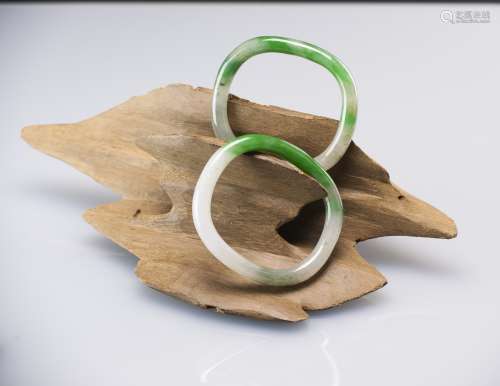 Qing<br>A Pair Of Important Green Jadeite Bangle<br>(Guarantee Grade A Natural Jadeite