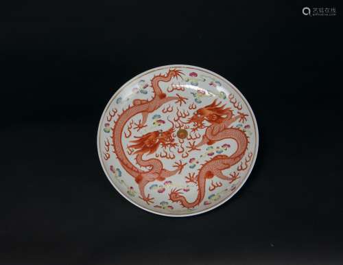 Guang Xu And Of The Period-A Chinese Famille-Rose Copper Red Double Dragon Charger<br>�a Qing Guangxu Nian Zhi�Guang Xu And Of The Period<br>A Famille-Rose Copper Red Double Dragon Charger<br>“Da Qing Guangxu Nian Zhi” Mark<br>D:34 cm. (13 3/8 in.)<br>清光緒<br>粉彩雙龍戲珠盤<br>“大清光緒年製”款