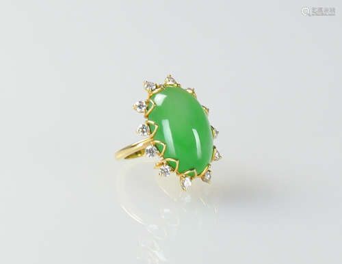 A Very Translucent Icy Green Cabochon Jadeite Mounted With Diamond Ring
