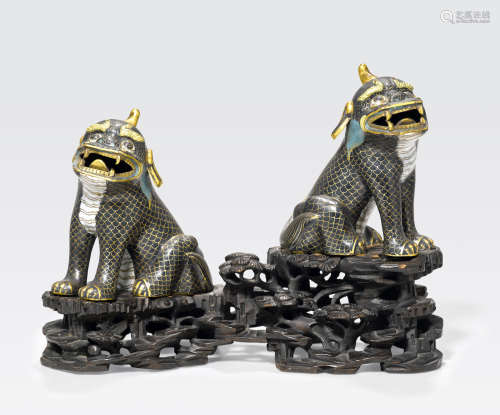 A pair of Chinese cloisonné enamel mythical animals 19th century